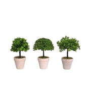 Vazo dekorative me bimë artificiale